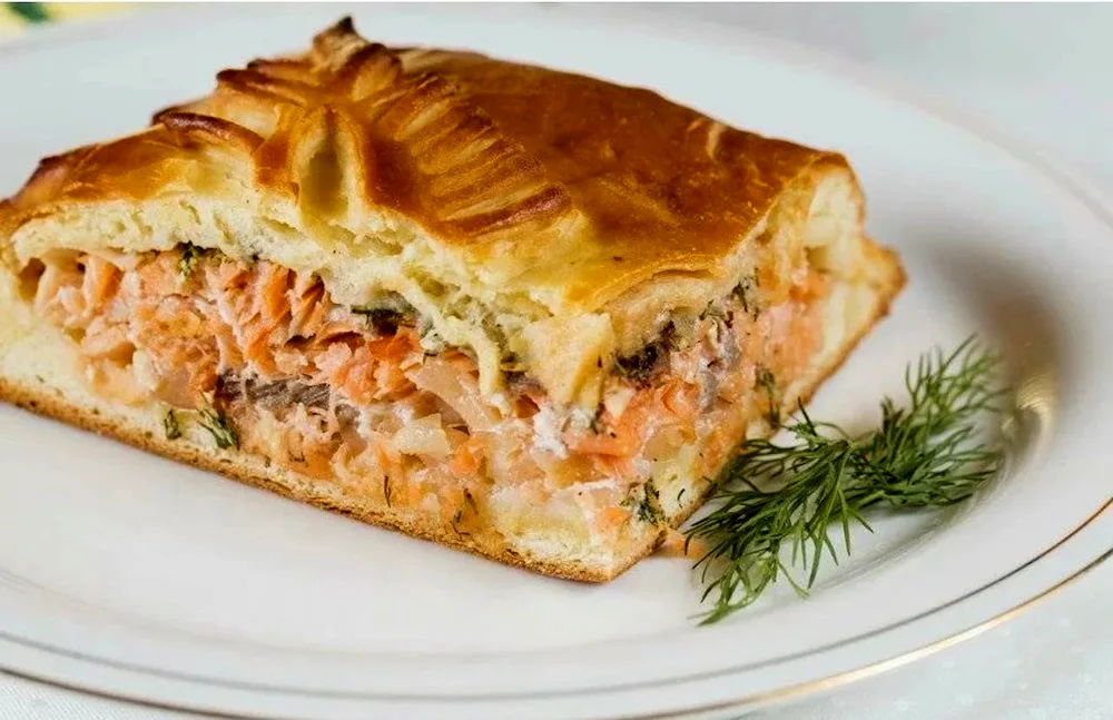 Humpback salmon pie with yeast dough in the oven
