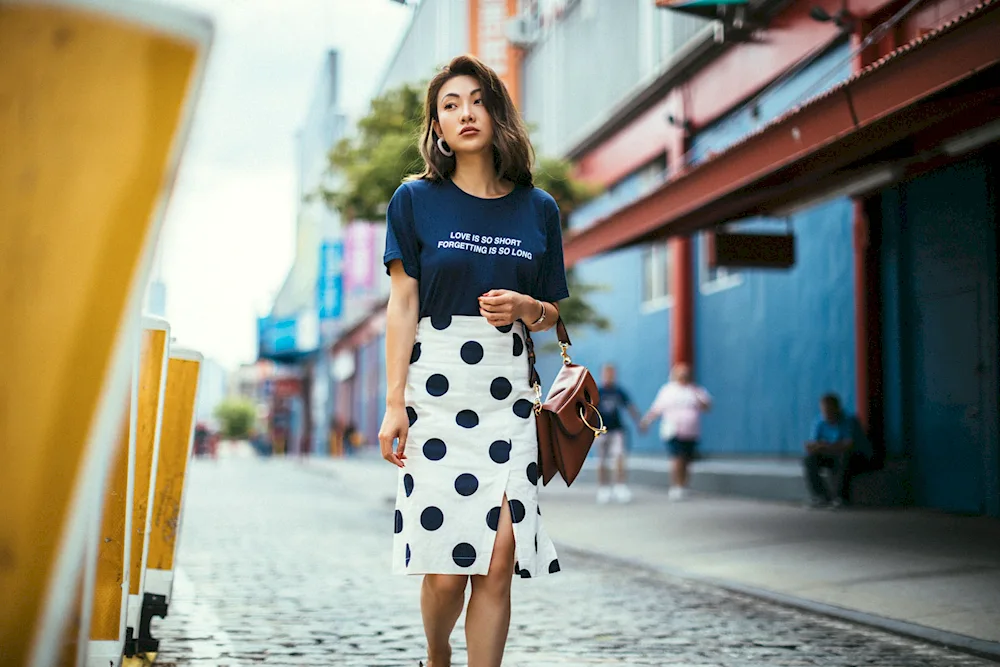 A polka dot dress and sneakers