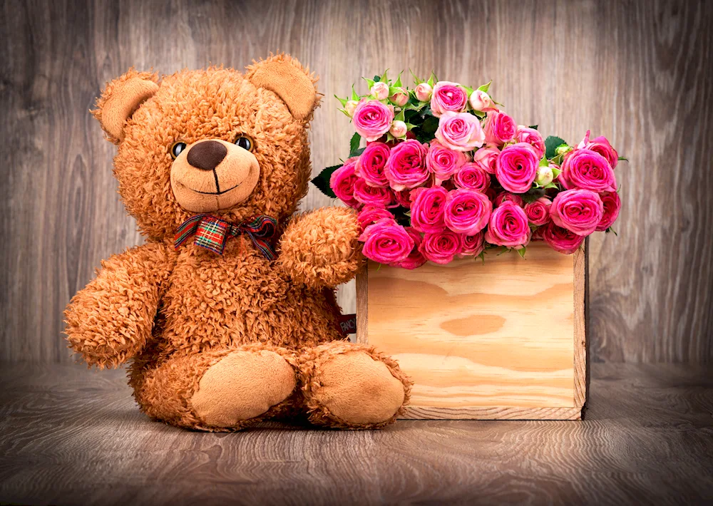 Teddy bear with flowers