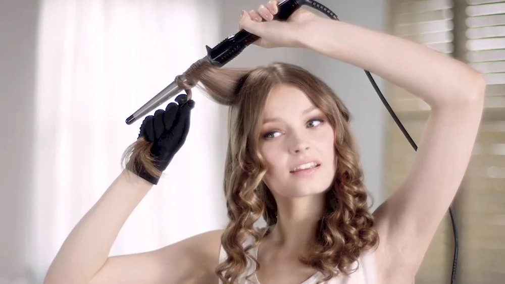Hair curls for medium hair with a curling iron