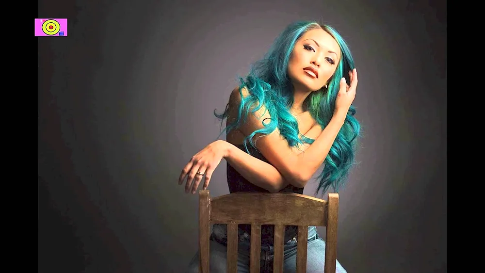 Kelsey James with green hair