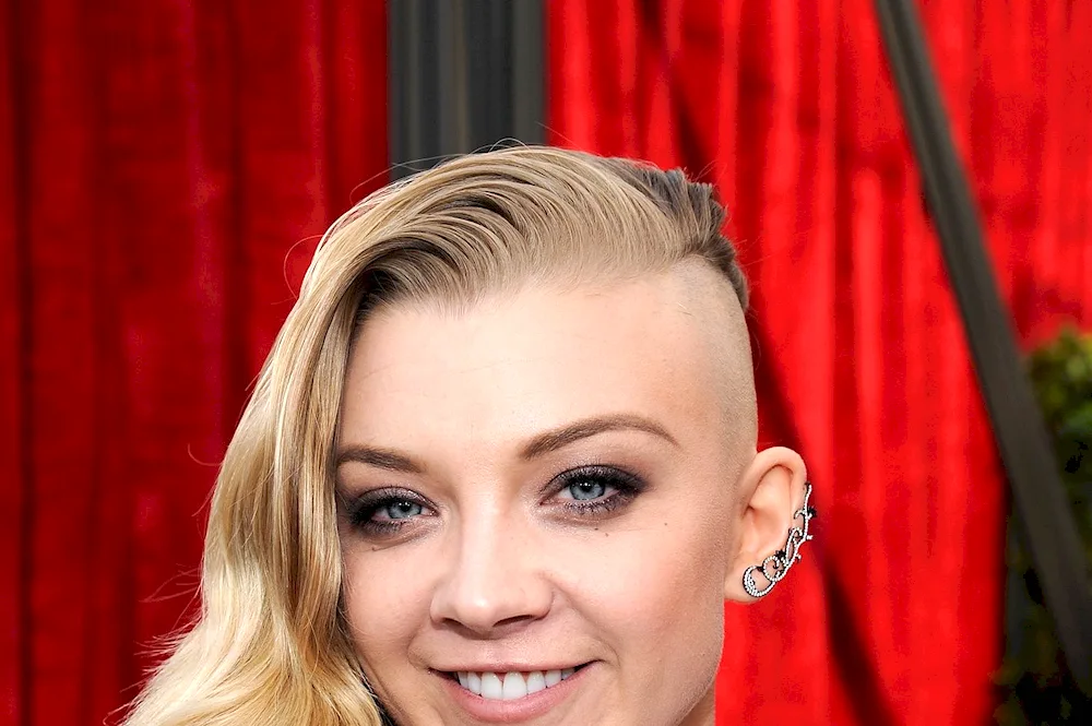 Men's haircut with shaved whiskers and long back of head