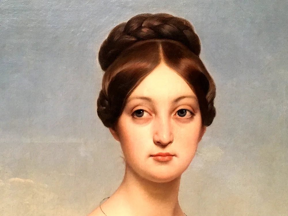 A hairstyle à- à la Pompadour 19th century