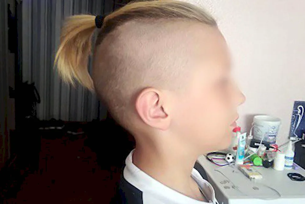 Boy hairstyle with a ponytail