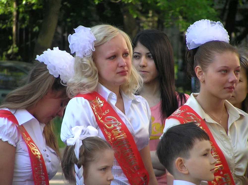 Graduates in school uniform