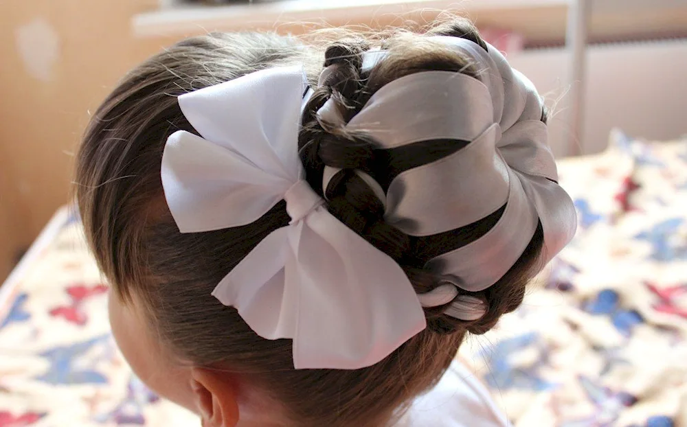 Hair with a bow for a girl