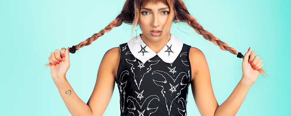 A hairstyle with braids in front