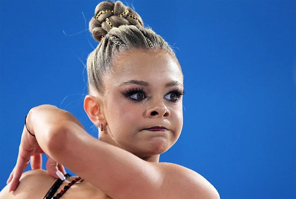 Gymnast hairstyles for gymnasts. gymnasts