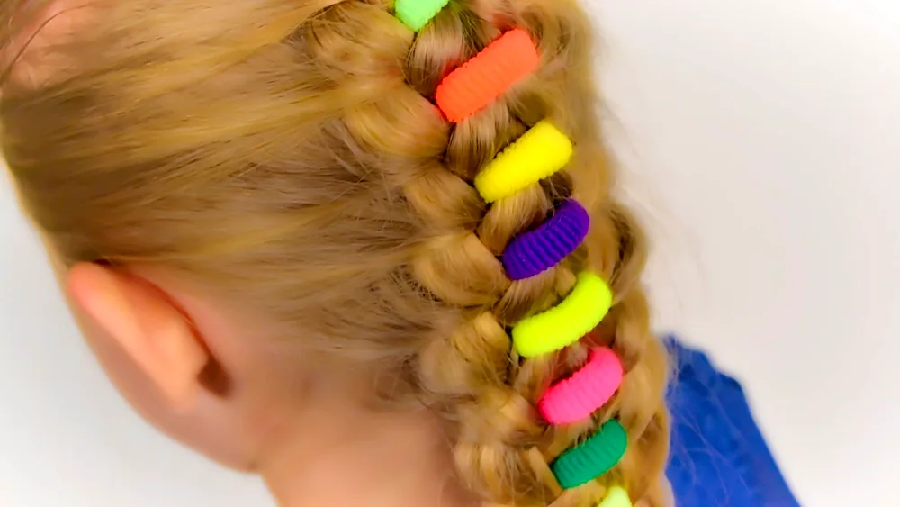 Braid for girls for kindergarten graduation on long hair