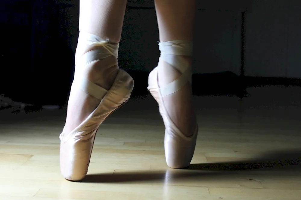 Pointe shoes of ballerina