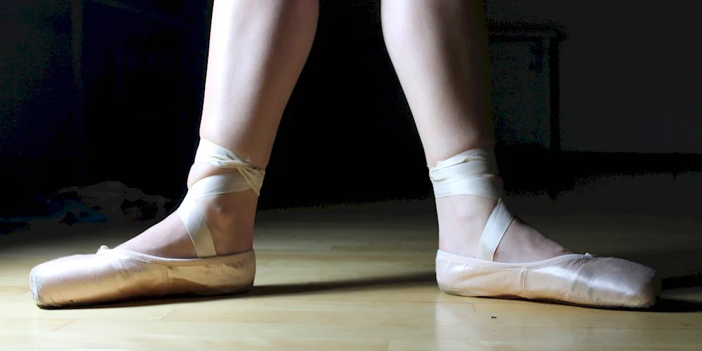 Pointe shoes of ballerina