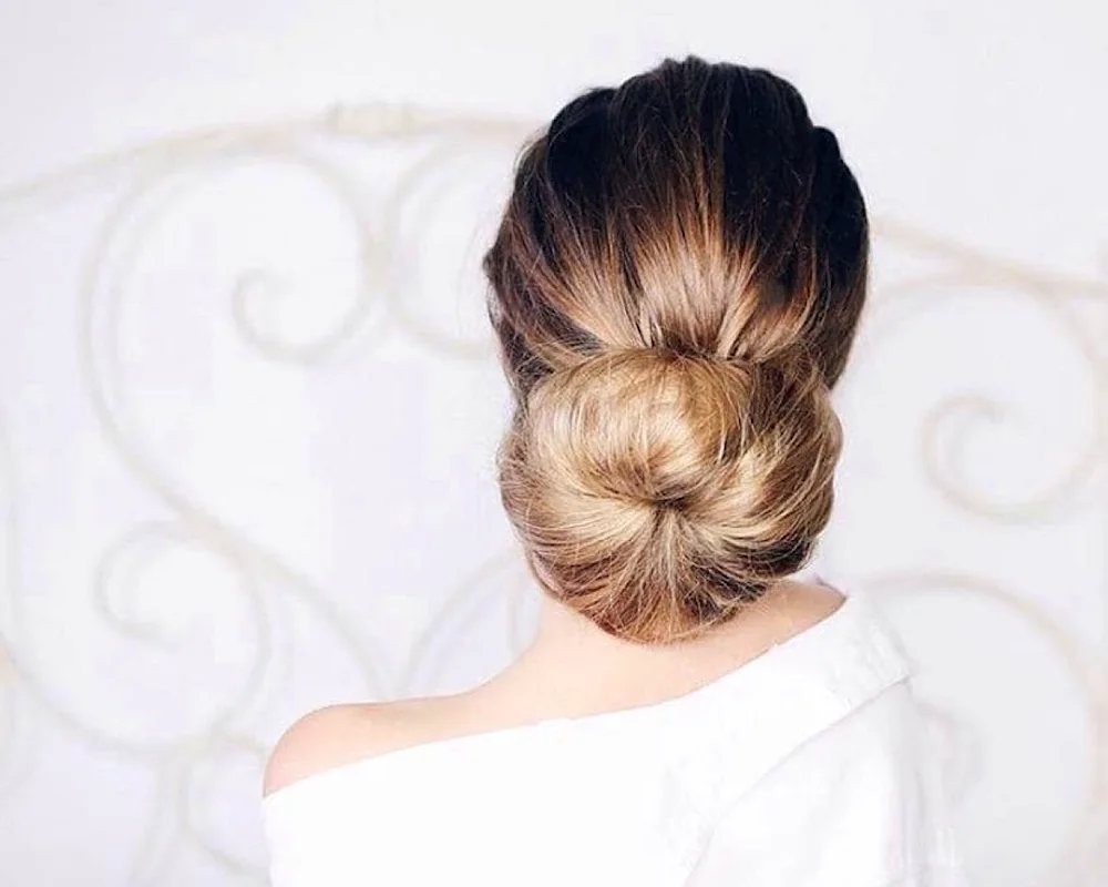 Bun with bagel on long hair