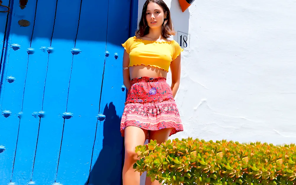 Riley Reynolds in skirt