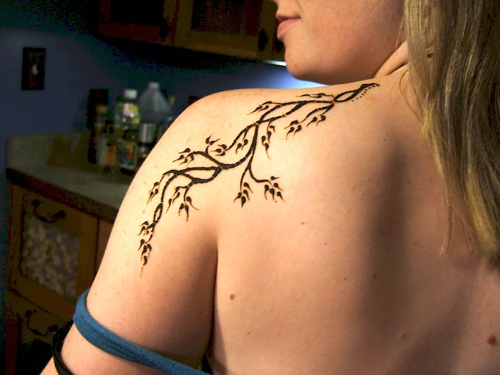 Henna designs on shoulder