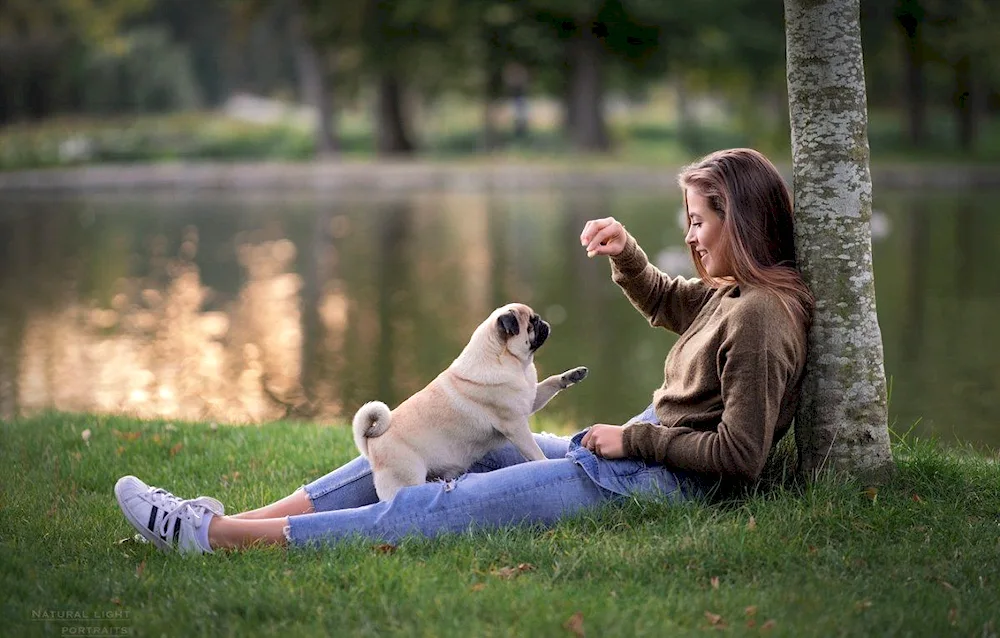 Model Jovana Ventura with a Doberman