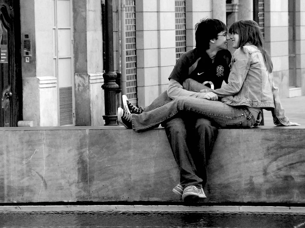 Kissing on a dark background