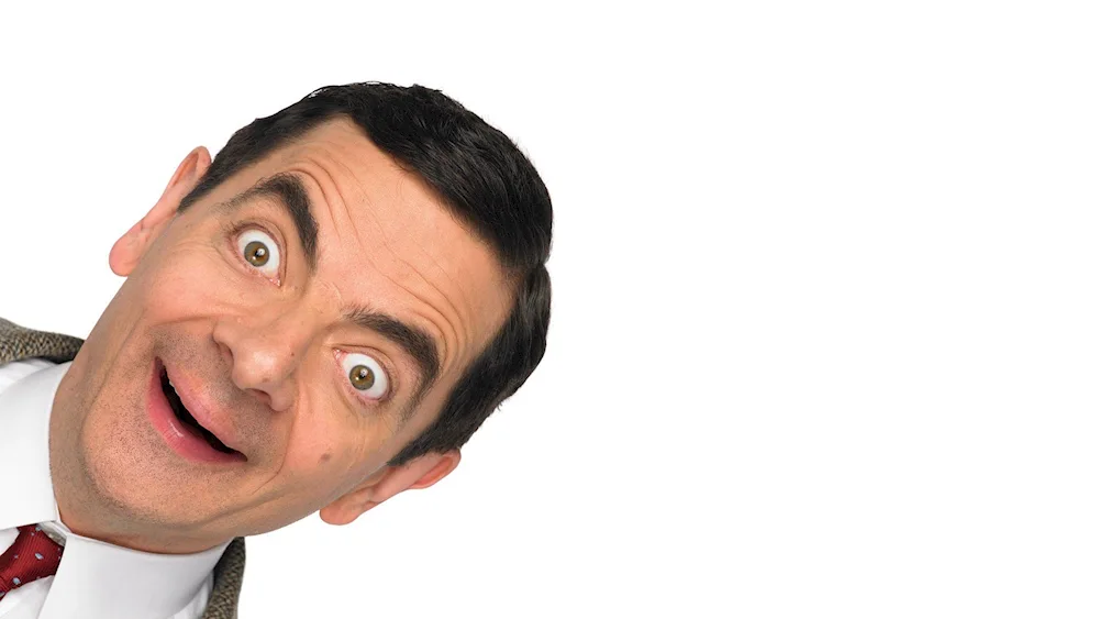 Rowan Atkinson grimaces