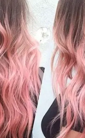 Pink strands on blonde hair