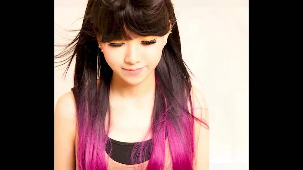Pink strands on dark hair