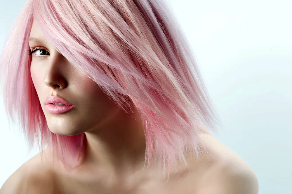 Pink strands on blonde hair