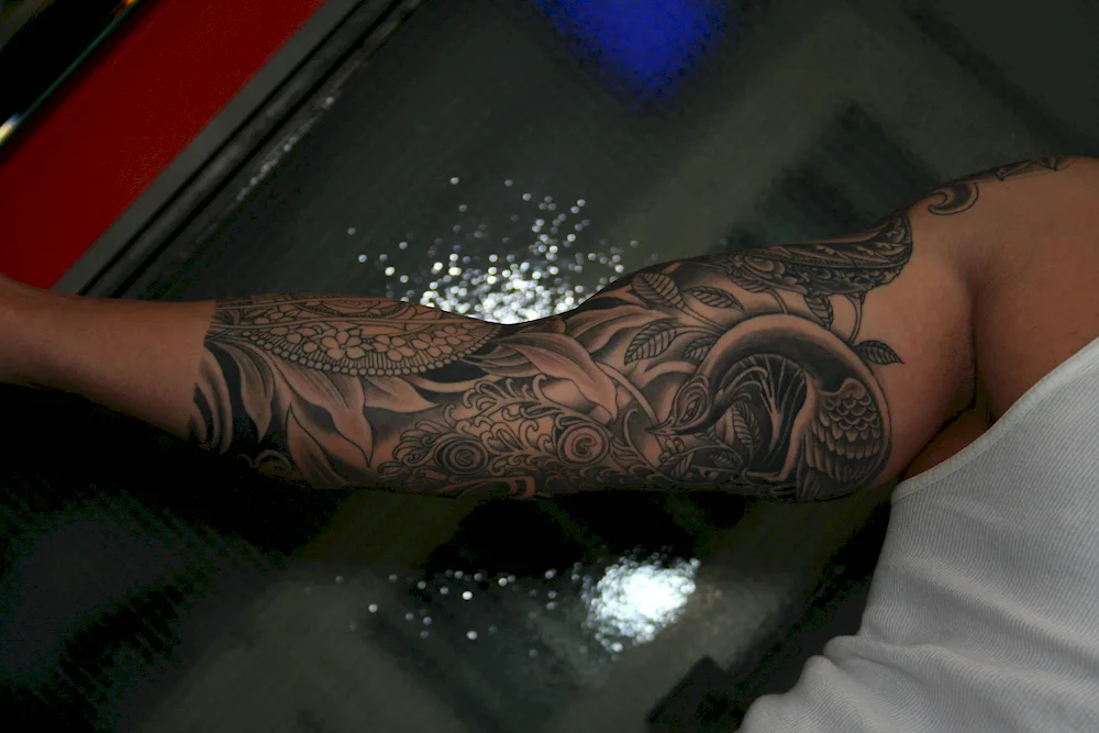 Sleeve tattoos on arm