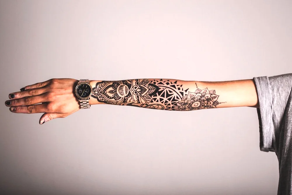 Sleeve tattoo to elbow