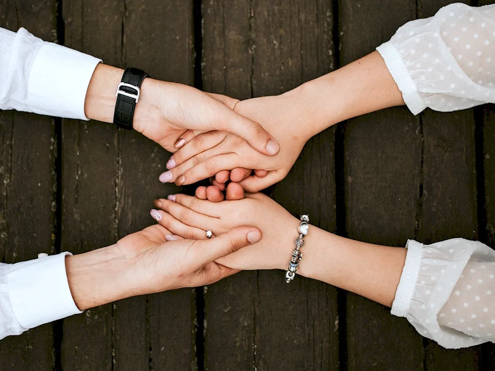 Male and female hands together