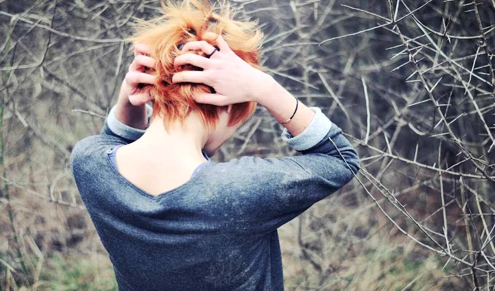 Redheaded girl with a bob