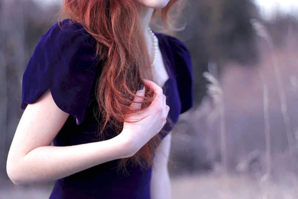 Redhead girl in a dress