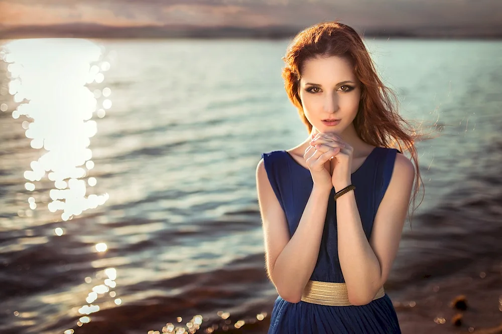 Girl coming out of the water