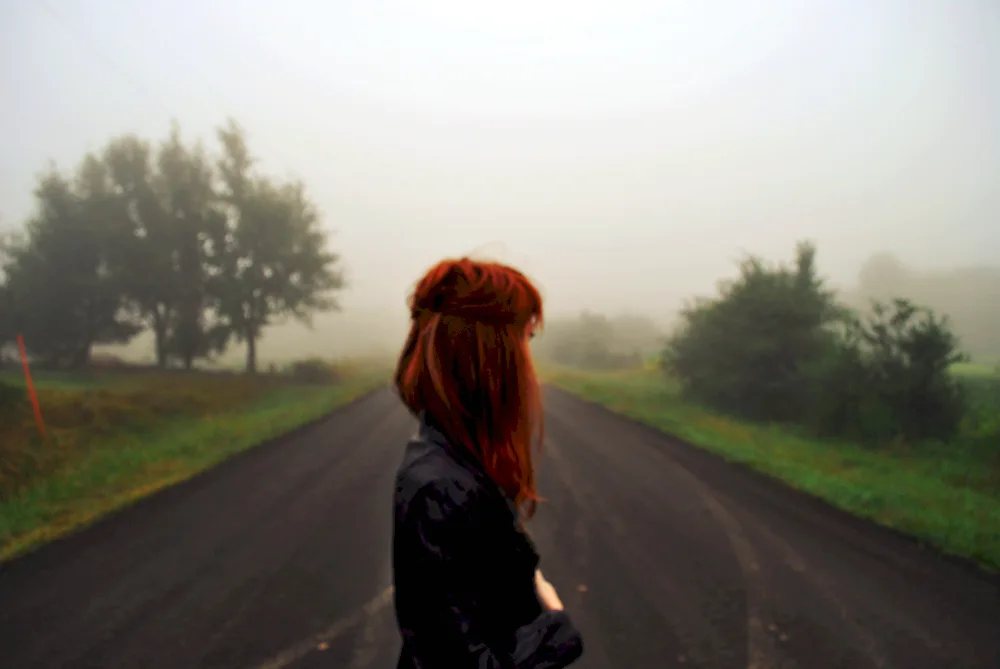 Redheaded girl with backs