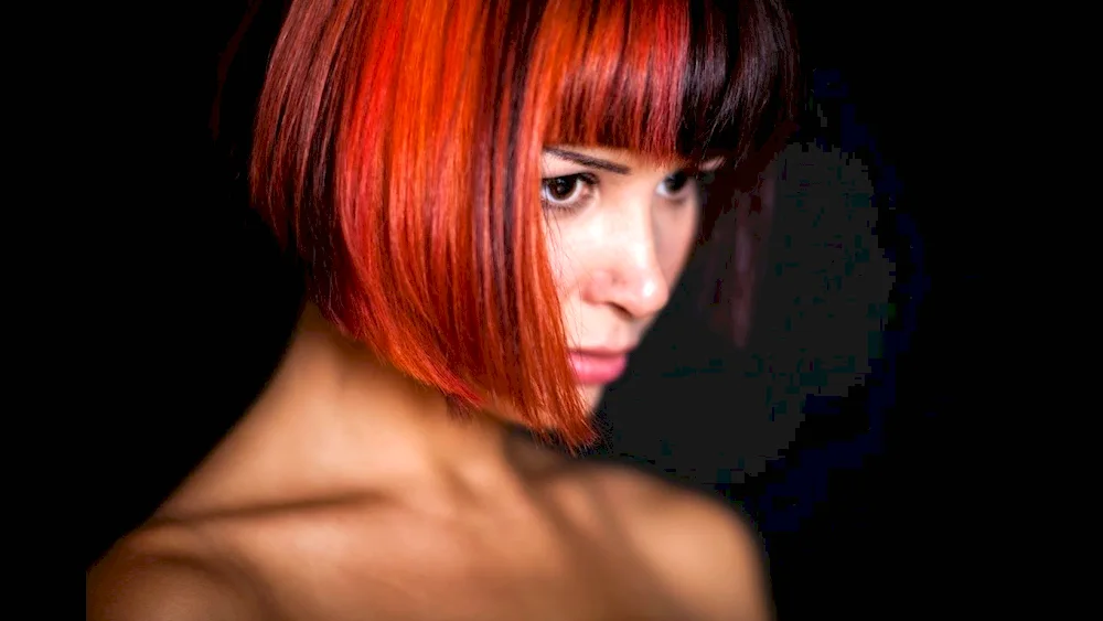 Red highlights for dark bobs