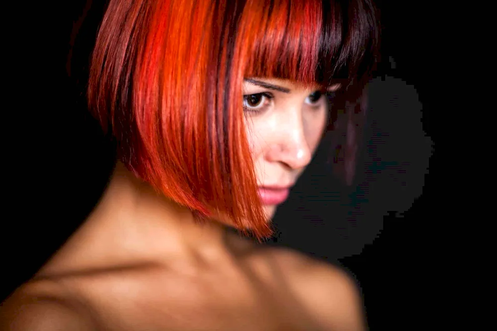 Red highlights on dark bob