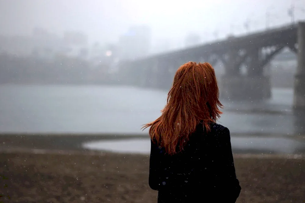 Redheaded girl with backs