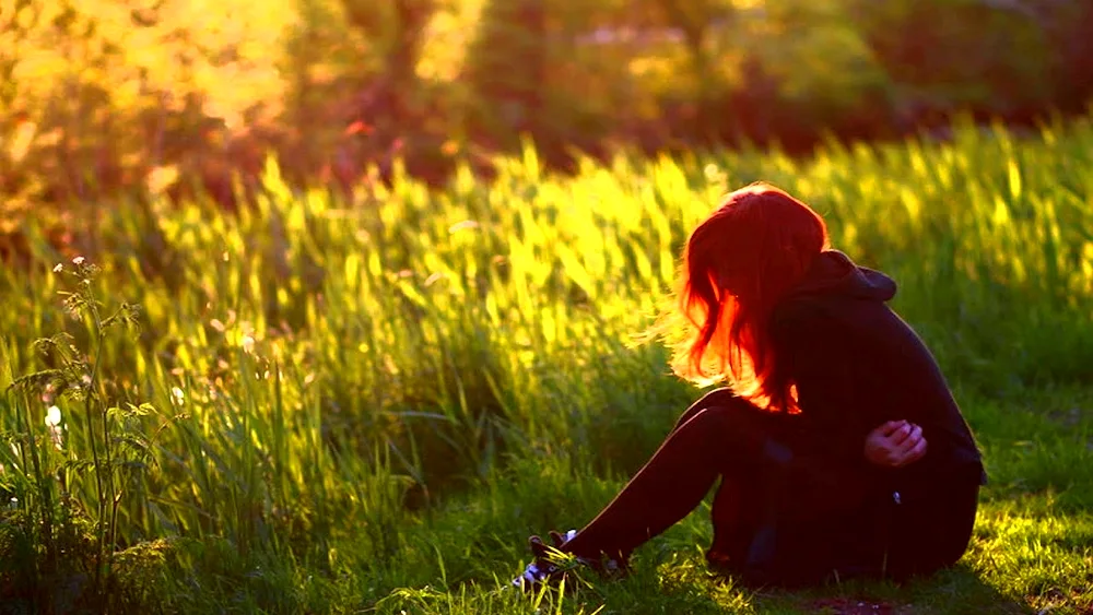 Redheaded girl from the back
