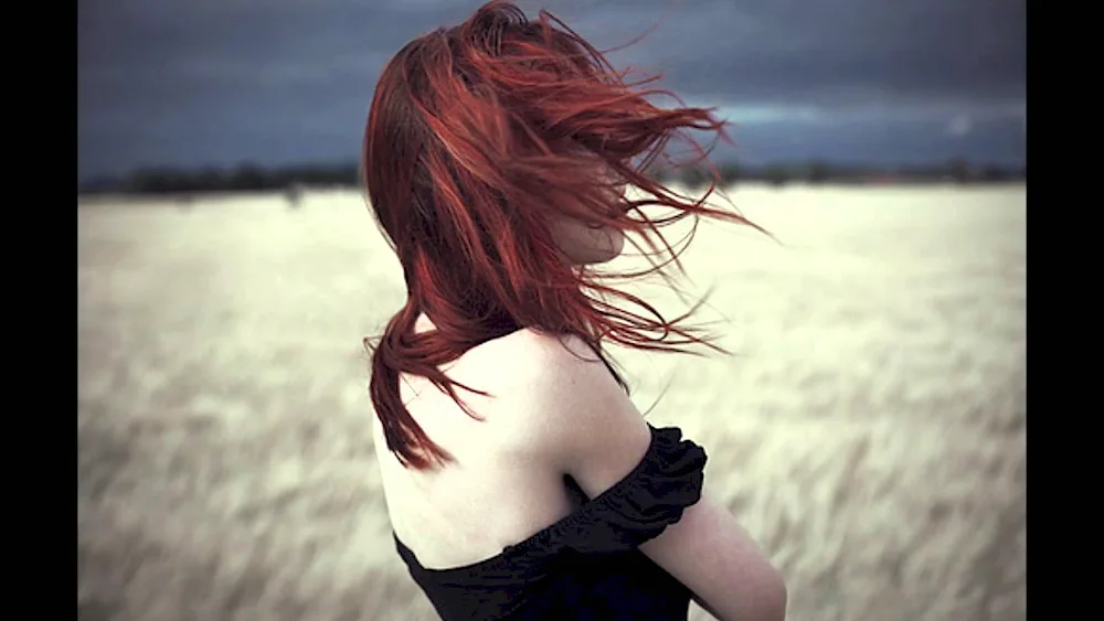 Redheaded girl with short hair