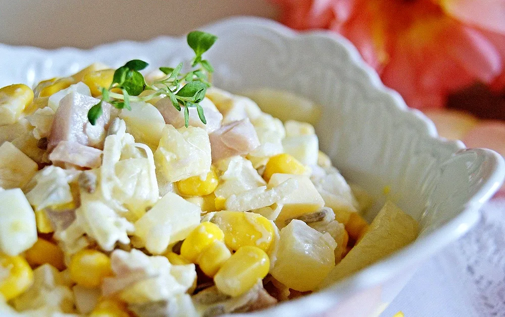 Salad chicken pineapple. corn