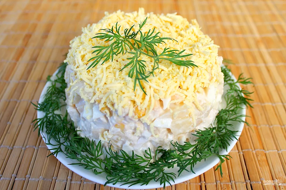 Salad with pineapple and smoked chicken and cheese and egg