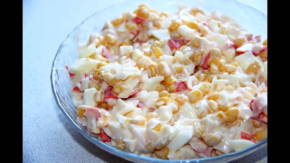 Salad with crab sticks and corn and corn and rice