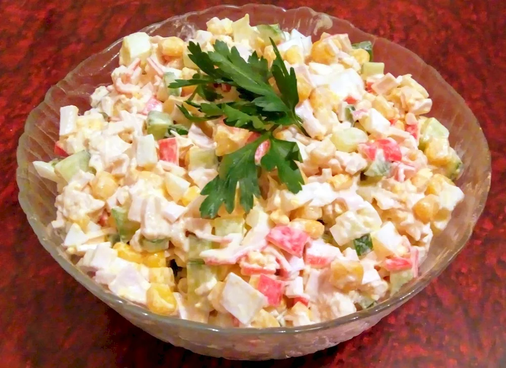 Salad with crab sticks and corn and cucumber