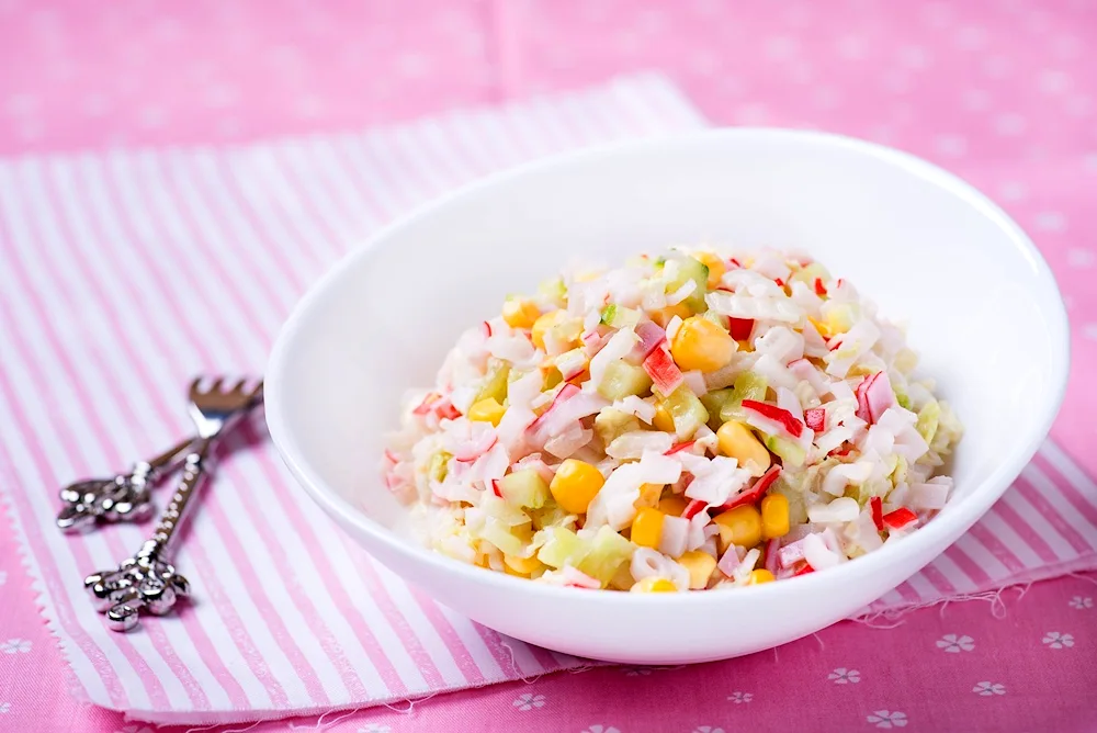 Crab salad with crab sticks and corn and rice