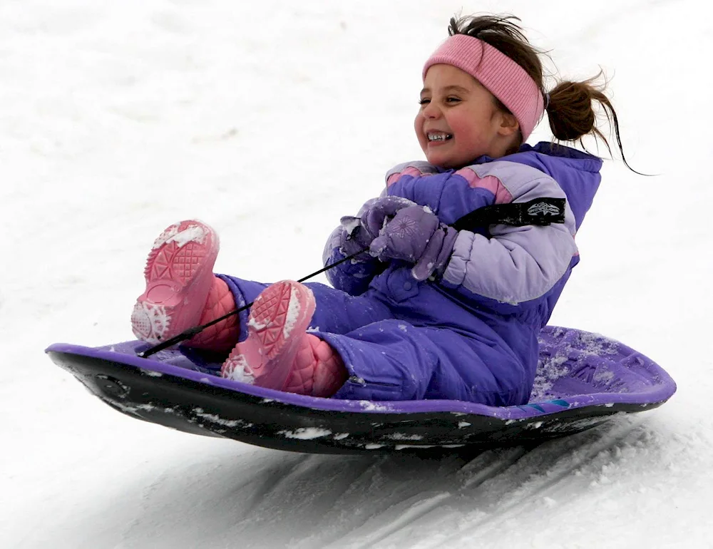 Children on a sled for preschoolers