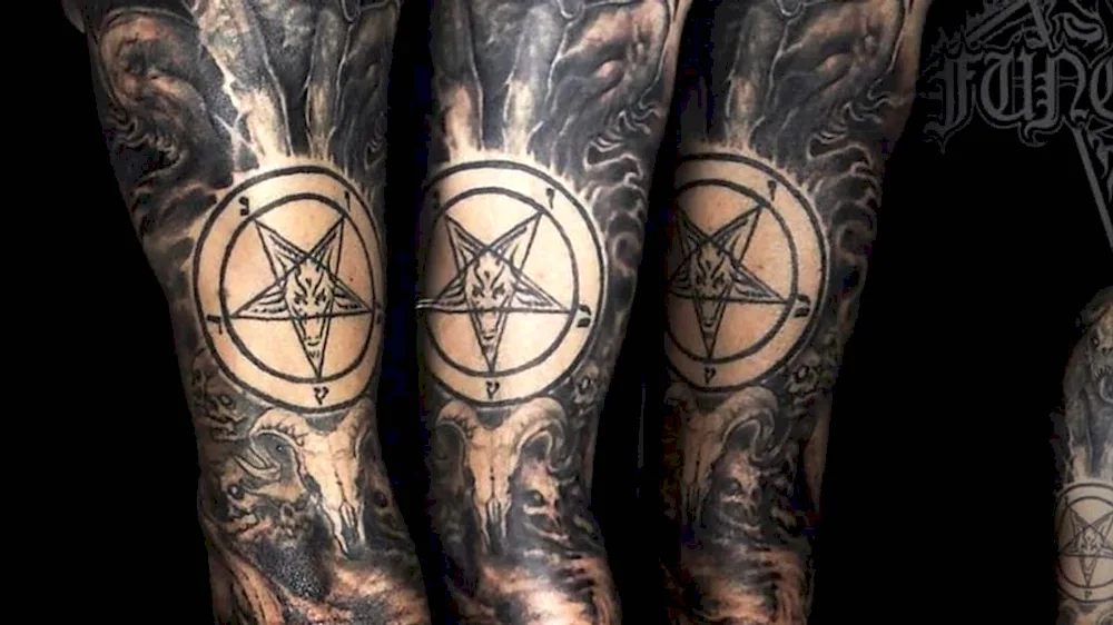 Satanic pentagram tattoo