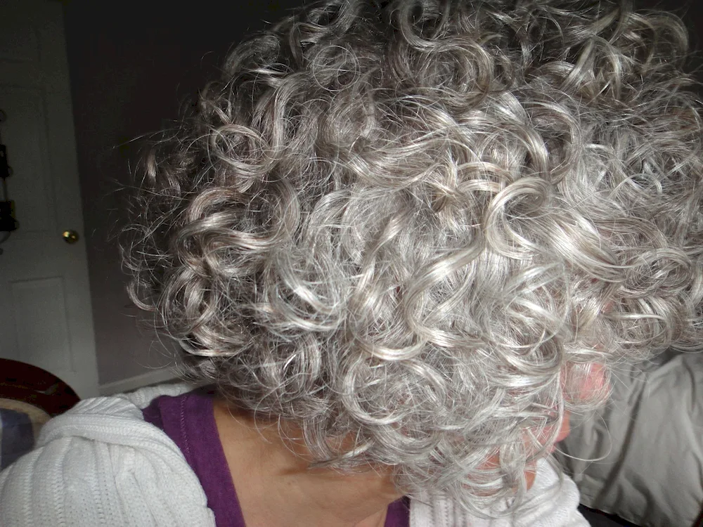 Grey curly hair