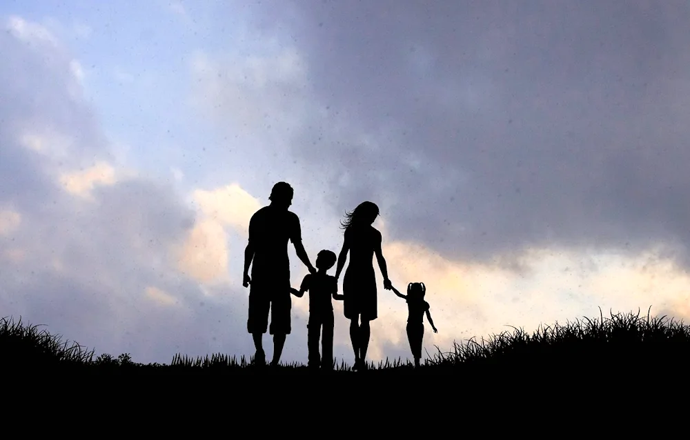 Family against the sunset