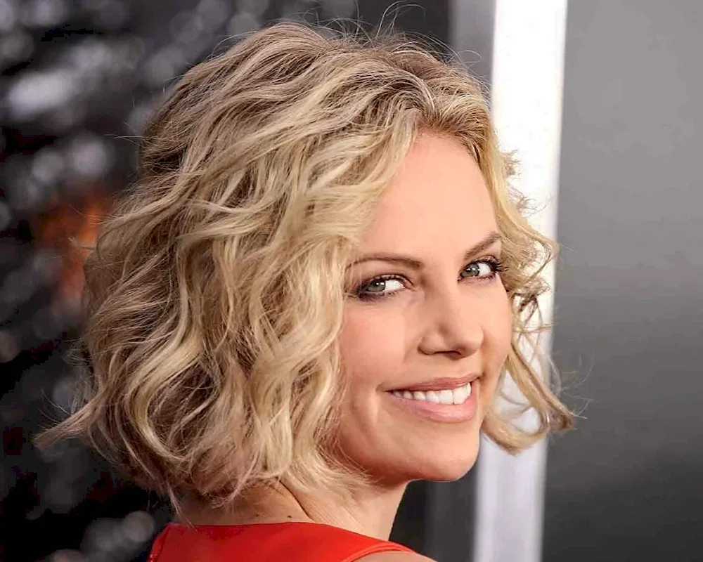 Charlise Theron with curls