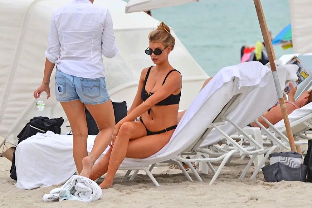 Charlotte MCKINNEY on the beach