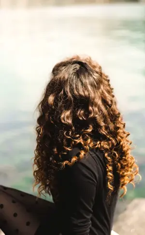 Brown girl with curly hair