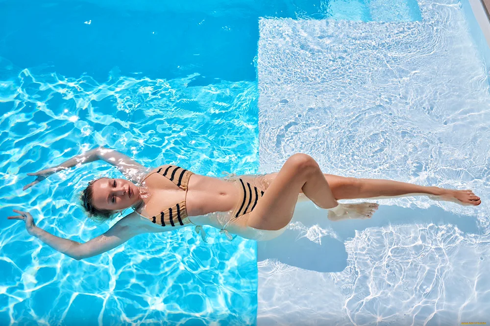 Brown hair by the pool
