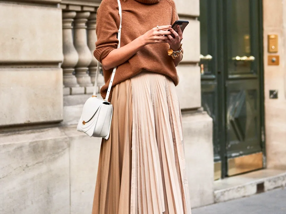 Jacket with pleated skirt